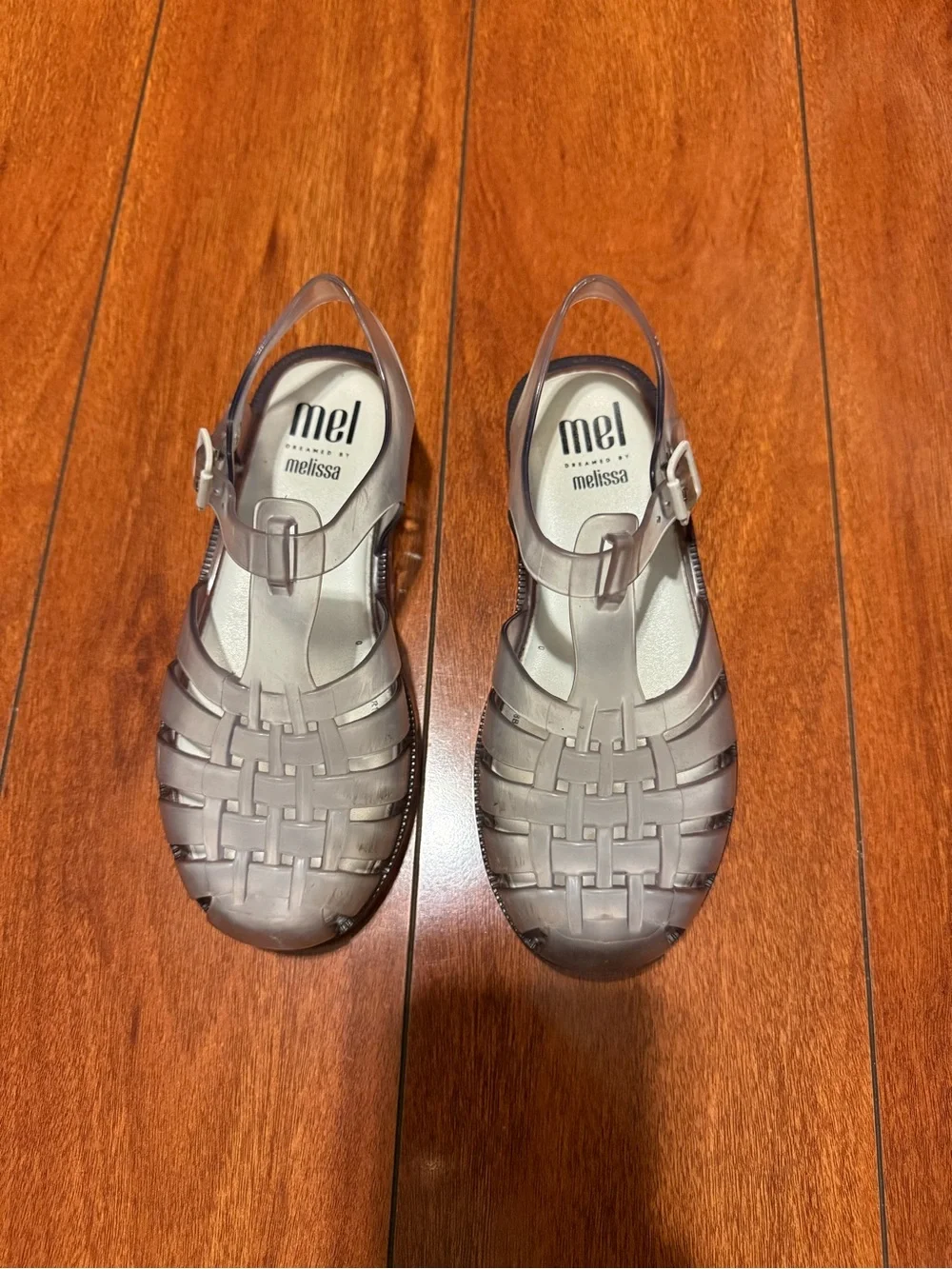 Mel by Melissa Translucent Jelly T-Strap Sandals in Smoky Taupe